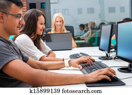 Group of students training on computers.