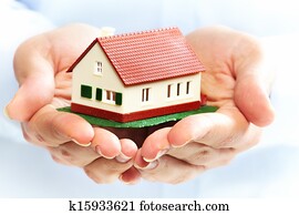 Hands with little house.