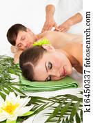 Happy Couple Getting Spa Treatment