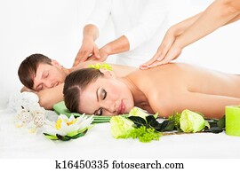 Happy Couple Getting Spa Treatment