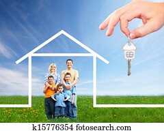 Happy family near new house.