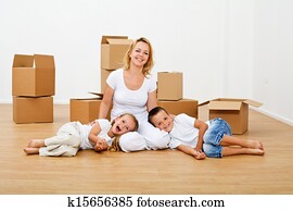 Happy people moving into a new house