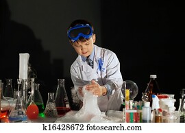 Image of little scientist watching experiment