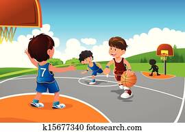 Kids playing basketball in a playground Kids playing basketball in a playground