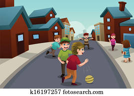 Kids playing in the street of a suburban neighborhood Kids playing in the street of a suburban neighborhood
