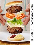 Levitating zero gravity burger in hands