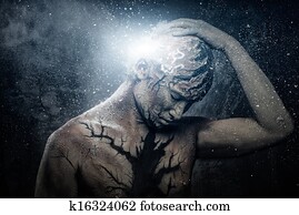 Man with conceptual spiritual body art