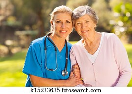 medical nurse and senior patient outdoors