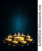 oil lamp with place for diwali greetings over dark background oil lamp with place for diwali greetings over dark background
