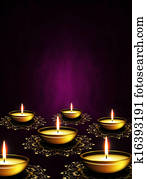 oil lamps with place for diwali greetings over dark background oil lamps with place for diwali greetings over dark background