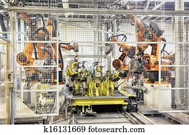 robôs, um carro, fábrica