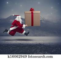Running Santa Claus with big gift Running Santa Claus with big gift
