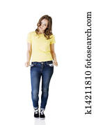 Sad young caucasian teen girl taking out empty pockets