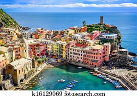 Scenic view of ocean and harbor in colorful village Vernazza, Cinque Terre, Italy Scenic view of ocean and harbor in colorful village Vernazza, Cinque Terre, Italy