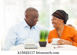 senior african couple relaxing at home
