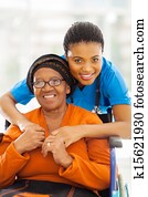 senior african disabled woman caregiver