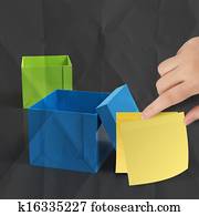 thinking outside the box on crumpled sticky note paper 
