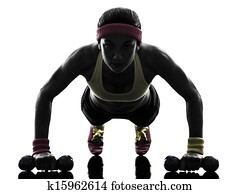 woman exercising fitness workout push ups  silhouette