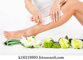 Woman Getting Legs Waxed Woman Getting Legs Waxed