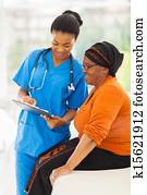 young african nurse explaining medical test result