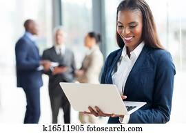 african American businesswoman using laptop