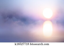art peaceful background, mist over water at sunrise