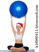 aziatisch meisje, zittende, met, een, bal, op, zijn, hoofd