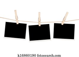Blank photos hanging on clothesline