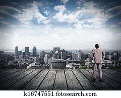 Businessman looking urban view. Businessman looking urban view.