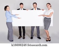 Businesspeople Holding Placard