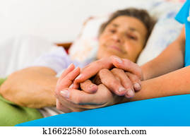 Caring Nurse Holding Hands Caring Nurse Holding Hands