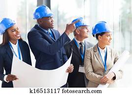 construction team discussing architectural project