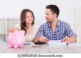 Couple Saving Money