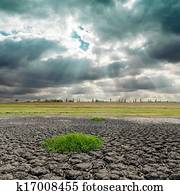 dramatic sky and cracked earth