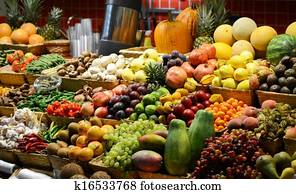 Fruit market with various colorful fresh fruits and vegetables - Market series