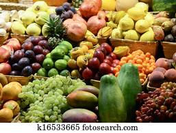 Fruit market with various colorful fresh fruits and vegetables - Market series