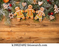 Gingerbread happy creatures on wood