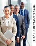 group of business executives standing in a row