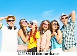 group of young people wearing sunglasses and hat