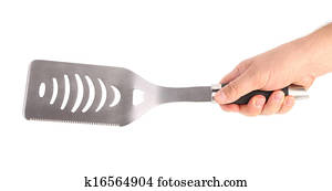 Hand hold of BBQ cutlery. Hand hold of BBQ cutlery.