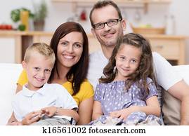 Happy family with a small son and daughter Happy family with a small son and daughter