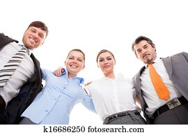 Huddle Of Happy Businesspeople