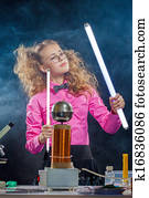 Image of ingenious girl conducting experiment