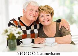 loving senior couple relaxing at home