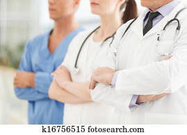 Only professional medical assistance. Cropped image of successful doctors team standing together with their arms crossed