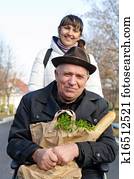 Smiling senior man with a bag of groceries Smiling senior man with a bag of groceries