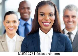 young african businesswoman with colleagues