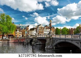 Amsterdam with canal in the downtown, Holland. Amsterdam with canal in the downtown, Holland.