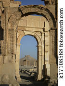 Arches, pillars and castle of ruins in Palmyria Syria.