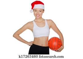 aziaat, met, een, bal, in, de, hoofdeksel, van, santa claus